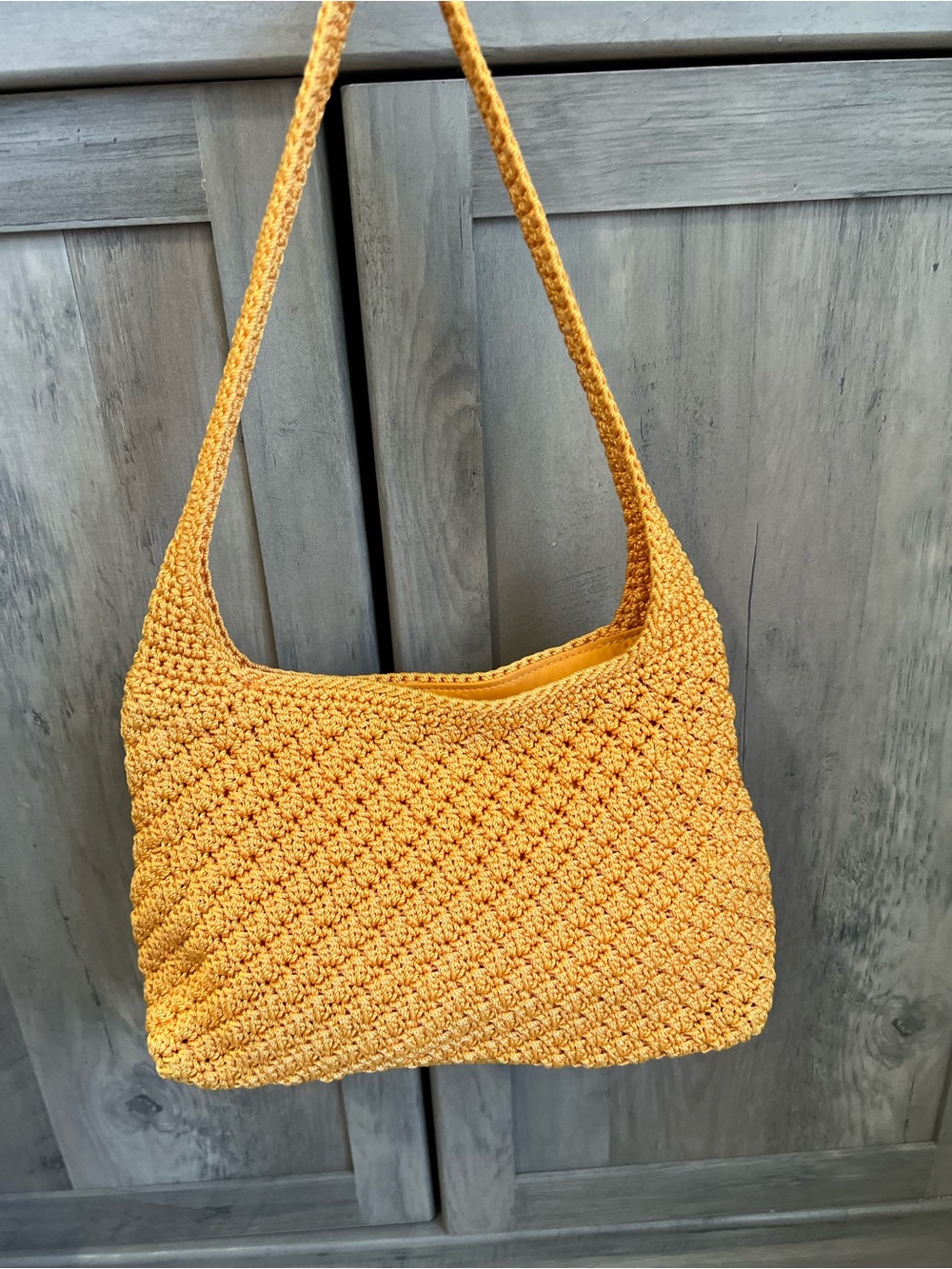 The Sak Handwoven Crochet Shoulder Bag in Mustard Yellow
